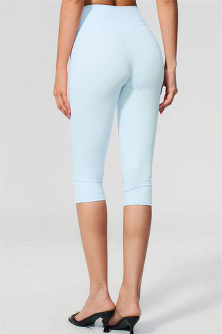 The Twirl Open Back Sports Bra Capri Leggings 2-Piece Set