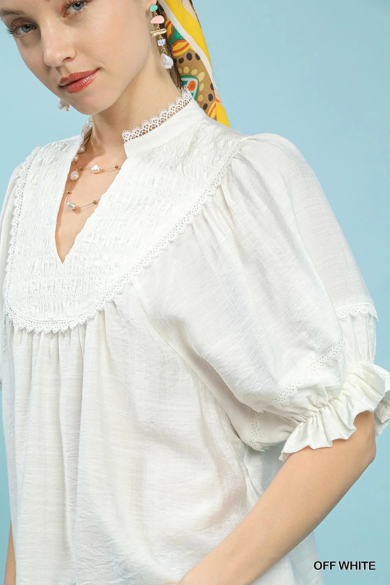 Umgee Smocked Yoke Blouse with Ruffle Sleeves in Off White - Glamourous Grace