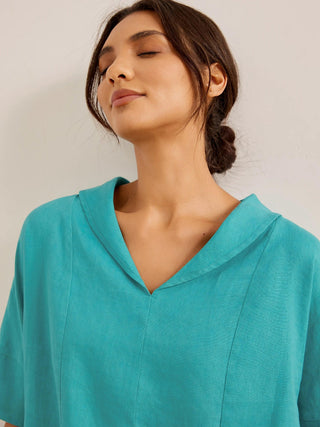 LINTICO Sierra linen V-neck short sleeve blouse, light-colored and breathable top, displayed on a white background.