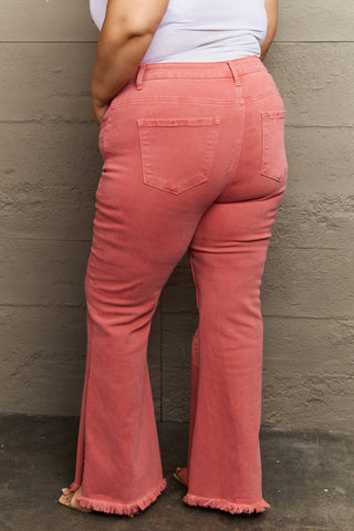 RISEN Bailey High Rise Raw Side Slit Hem Flared Leg Pink Denim Jeans