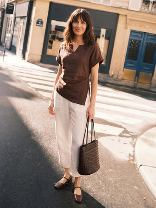 Espresso brown linen blouse with asymmetric hem, side gathers, and split-neck design by LINTICO.