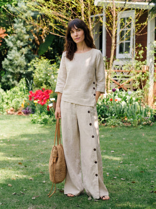LINTICO 100% linen buttoned slit-hem pants in stone oat color, featuring a relaxed fit and stylish design.