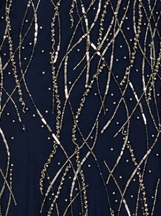 Elegant Beaded Dress with Long Cape