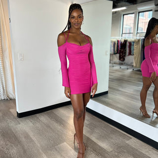 Lady Black Tie Zoe Mini Dress in black, long sleeve short dress style, shown on a model with a fitted silhouette.