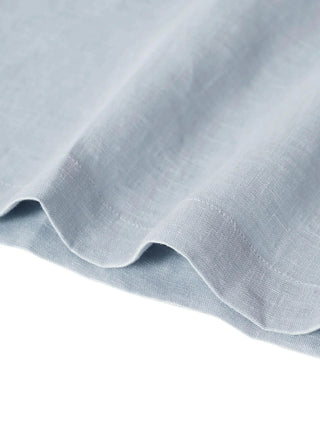 LINTICO 100% linen boatneck blouse with 3/4 length sleeves in a light, breathable fabric, displayed on a hanger.