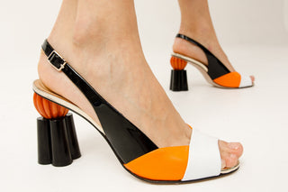 The Rize Black & Orange Pumpkin Heel Leather Women Sandal - Glamourous Grace