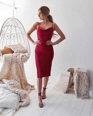 Lady Black Tie Aspen Midi Dress in deep red satin slip style, shown on a model, highlighting elegant, flowing fabric and sleek design.