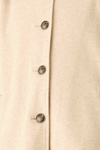 CITY IN MOTION BUCKLED CAPELET JACKET