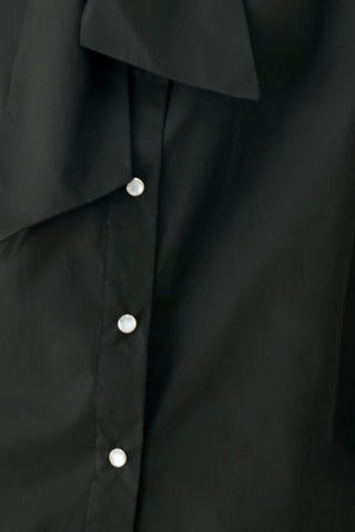MODERN STATEMENT BOW WOVEN TOP