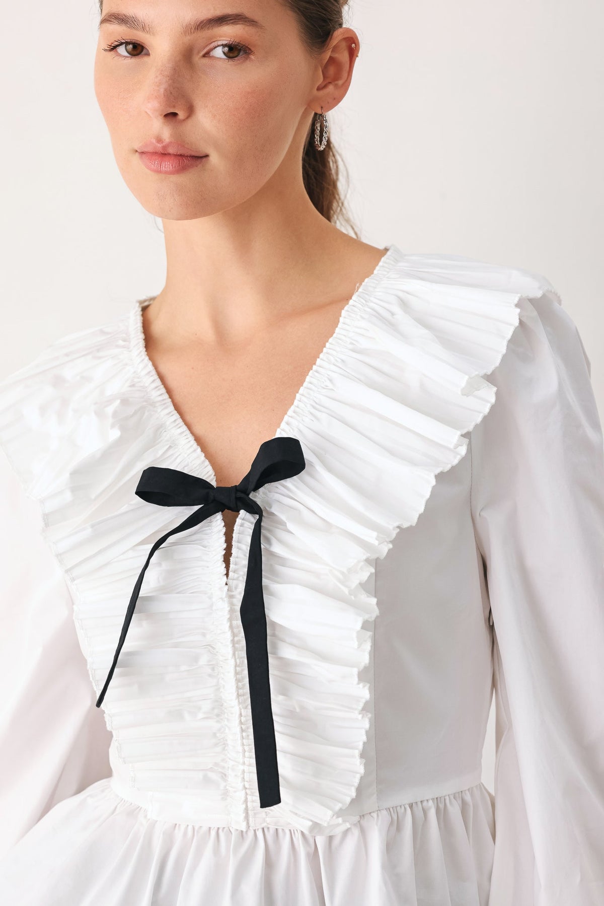 AMELIE PLEATED RUFFLE V-NECK WOVEN TOP - Glamourous Grace