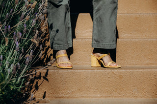 Yellow suede Stormi heels by J.Adams featuring a sleek design with a pointed toe and stiletto heel.