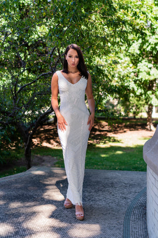 Lara Bryant beaded tank sheath wedding dress by Lara New York, featuring intricate beadwork and elegant design.