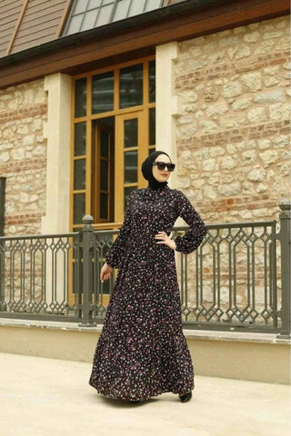 Katia maxi dress by ByBaano featuring a classic Peter Pan collar, flowing fabric, and elegant design perfect for stylish occasions.