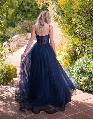 Navy Yasmin Gown by Lady Black Tie, tulle A-line dress with pleated bodice, flowing skirt, and elegant design.
