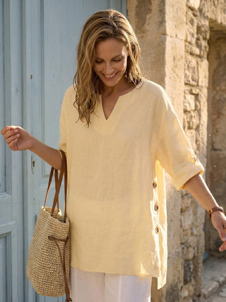 LINTICO 100% linen oversized curved-hem top in soft butter color, casual and relaxed fit, perfect for stylish everyday wear.