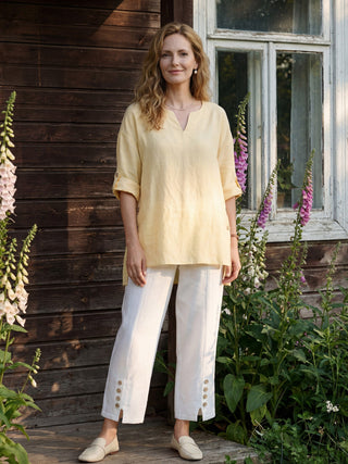 LINTICO Daphnea 100% linen oversized top with curved hem, soft butter color, relaxed fit, and stylish lightweight design.