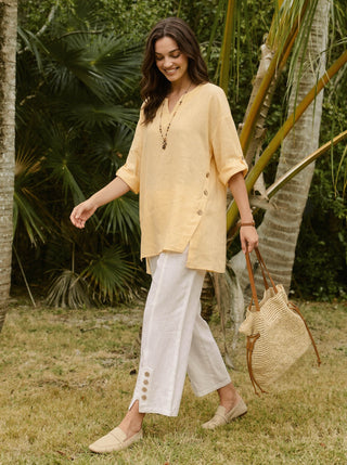 LINTICO 100% linen buttoned split-hem pants, stylish and comfortable bottoms with a relaxed fit and natural linen fabric.