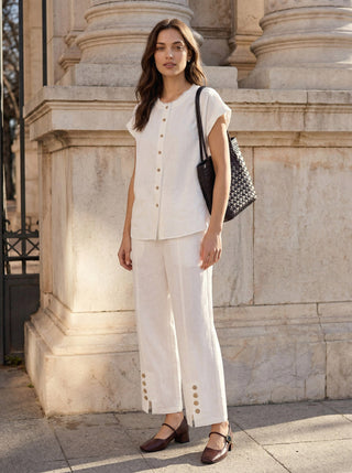LINTICO 100% linen buttoned split-hem pants, stylish casual bottoms with relaxed fit and side pockets, in natural linen fabric.