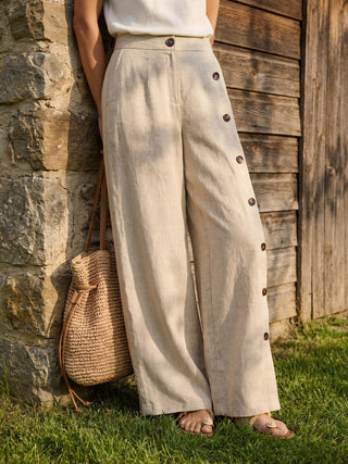 LINTICO 100% linen buttoned slit-hem pants in stone oat color, casual stylish bottoms with a relaxed fit and side pockets.