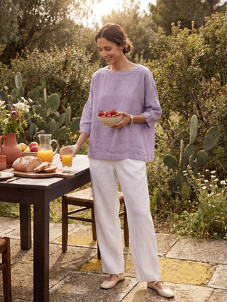 Lavender linen boatneck top with 3/4 length sleeves by LINTICO, featuring a relaxed fit and lightweight fabric.