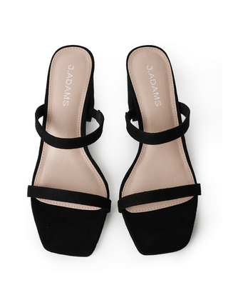 Black suede heels from J.Adams Stormi collection, stylish women's high-heeled shoes with a sleek design.