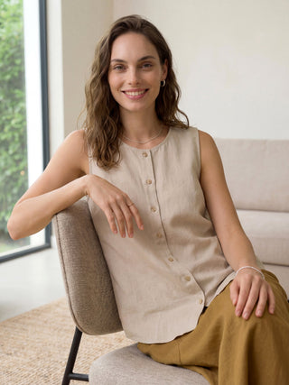 Khaki linen tank top with button-down front by LINTICO, featuring a sleeveless design and relaxed fit.
