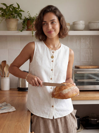 LINTICO Erin 100% linen button-down tank top in optic white, lightweight sleeveless top with a relaxed fit.