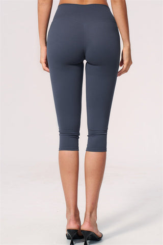 The Twirl Open Back Sports Bra Capri Leggings 2-Piece Set