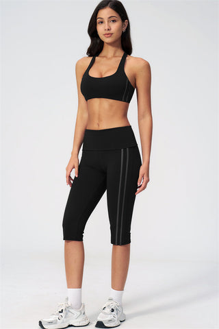The Evoke Racerback Sports Bra Capri Leggings 2-Piece Set