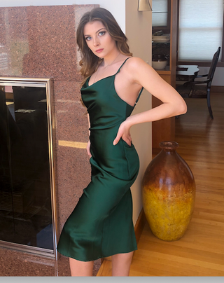 Emerald green satin Aspen Midi Dress by Lady Black Tie, featuring a sleek slip design and elegant midi length.