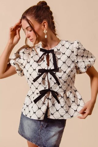 SO ME Bow Texture Woven Peplum Top With Contrast Tie - Glamourous Grace