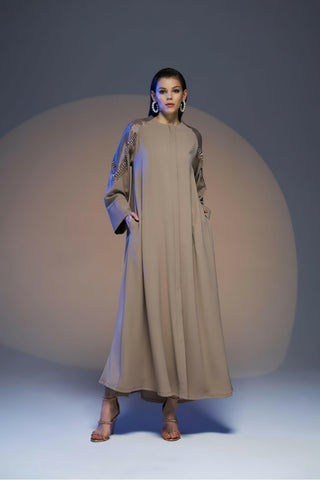 By Baano Anna open Abaya with embellished sleeves, featuring intricate design and flowing fabric for elegant modest wear.
