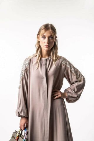 Zoie Long Abaya by BY Baano with front zipper, flowing black fabric, long sleeves, and elegant modest design.