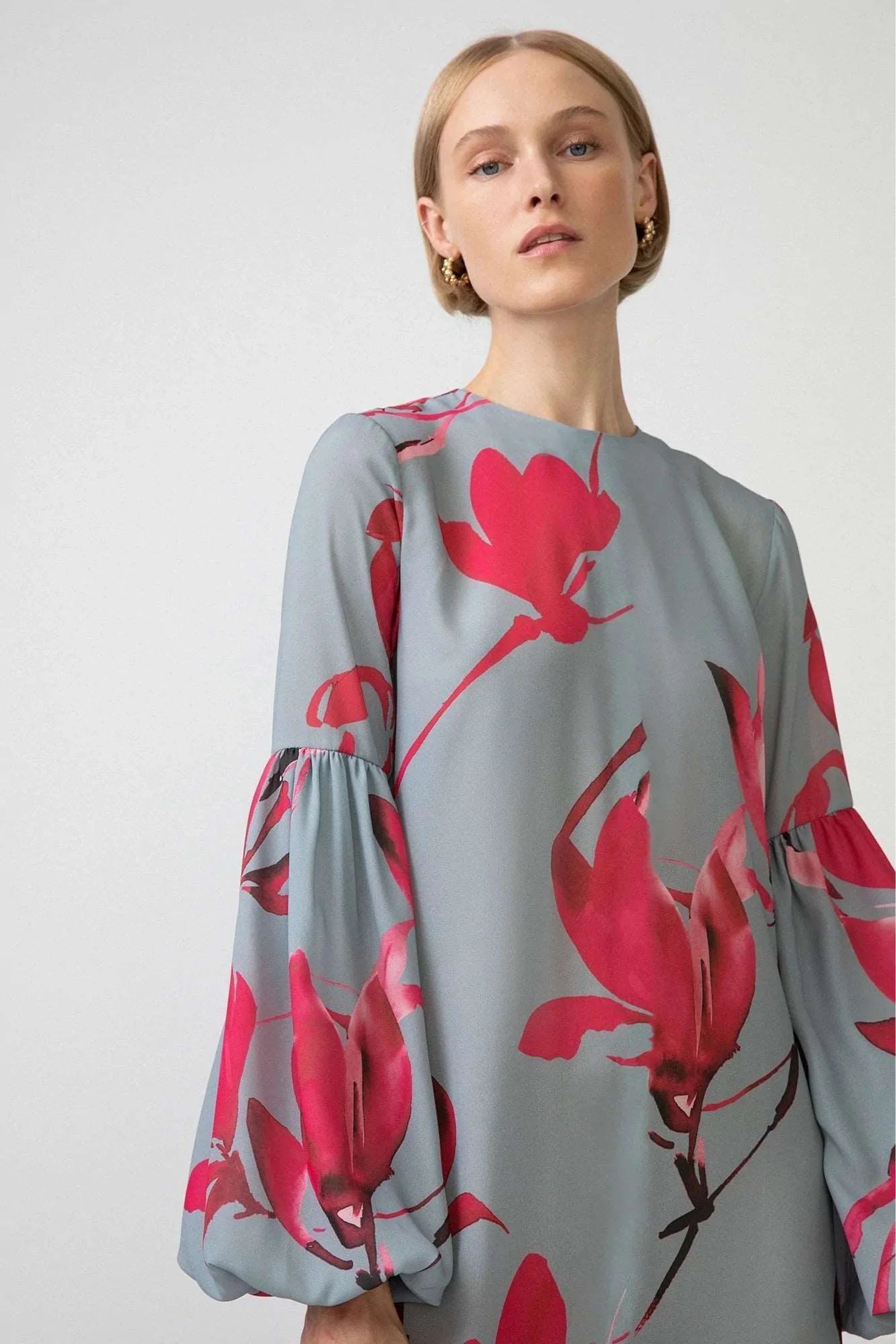 By Baano gray balloon long sleeve dress with floral pattern, featuring a relaxed fit and elegant design.