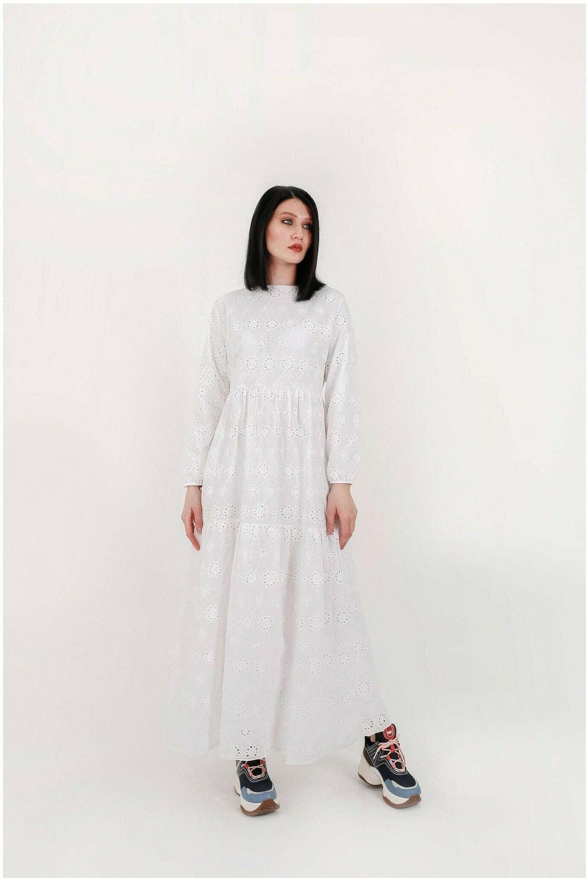 White cotton Sienna midi dress by BY Baano, featuring a flowy silhouette and sleeveless design in a stylish, elegant style.