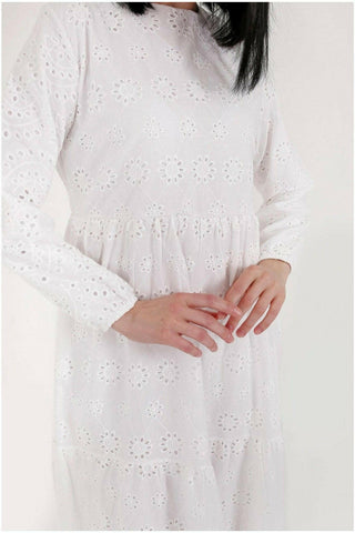 White cotton Sienna midi dress by BY Baano, featuring a flowing silhouette, sleeveless design, and subtle stitching details.