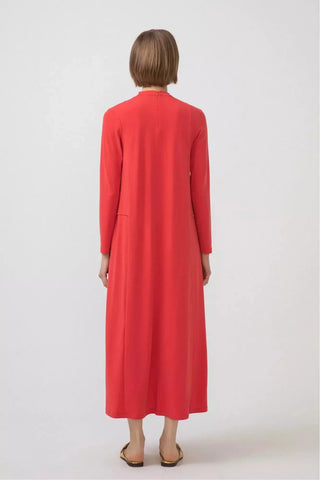 Orange By Baano premium quality jersey dress, lightweight and comfortable, shown on a model with a relaxed fit and stylish design.