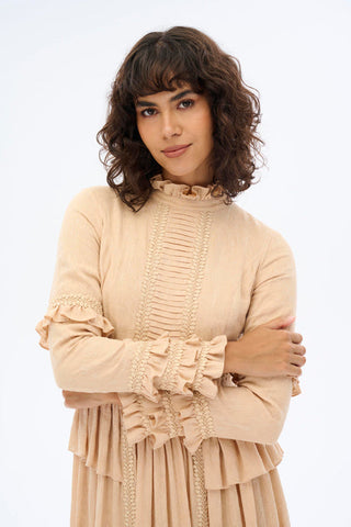 Beige high collar lace dress by By Baano, featuring intricate lace details and a stylish high neckline, perfect for elegant occasions.