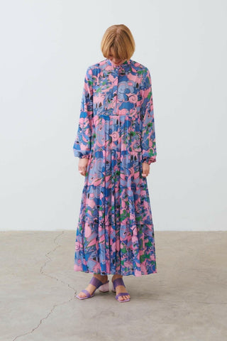 Lavender long sleeve maxi dress from By Baano's Naomi collection, flowing fabric and elegant design.