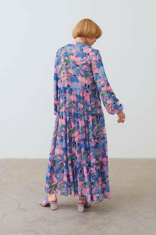 Long sleeve lavender maxi dress by By Baano featuring a flowing silhouette and elegant design.