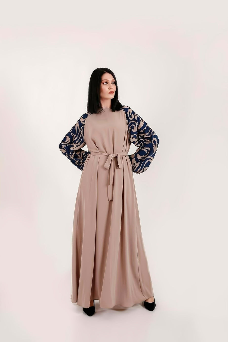 BY Baano Alissa modest maxi dress with long sleeves, elegant abaya style, in flowing fabric suitable for modest fashion.
