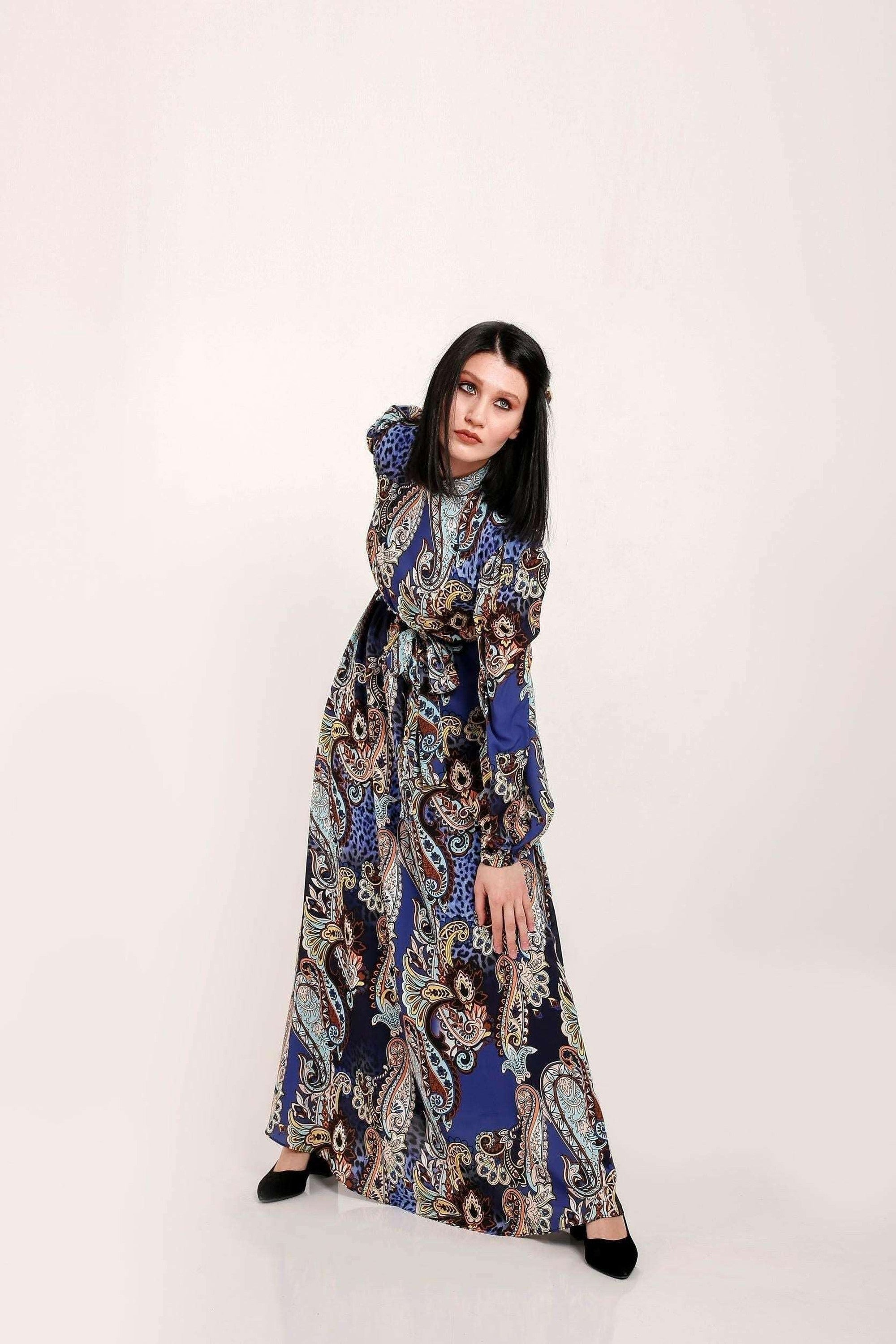 BY Baano Hailey Long Sleeve Maxi Dress with self-belt, floor-length design, and elegant style, perfect for casual or formal wear.