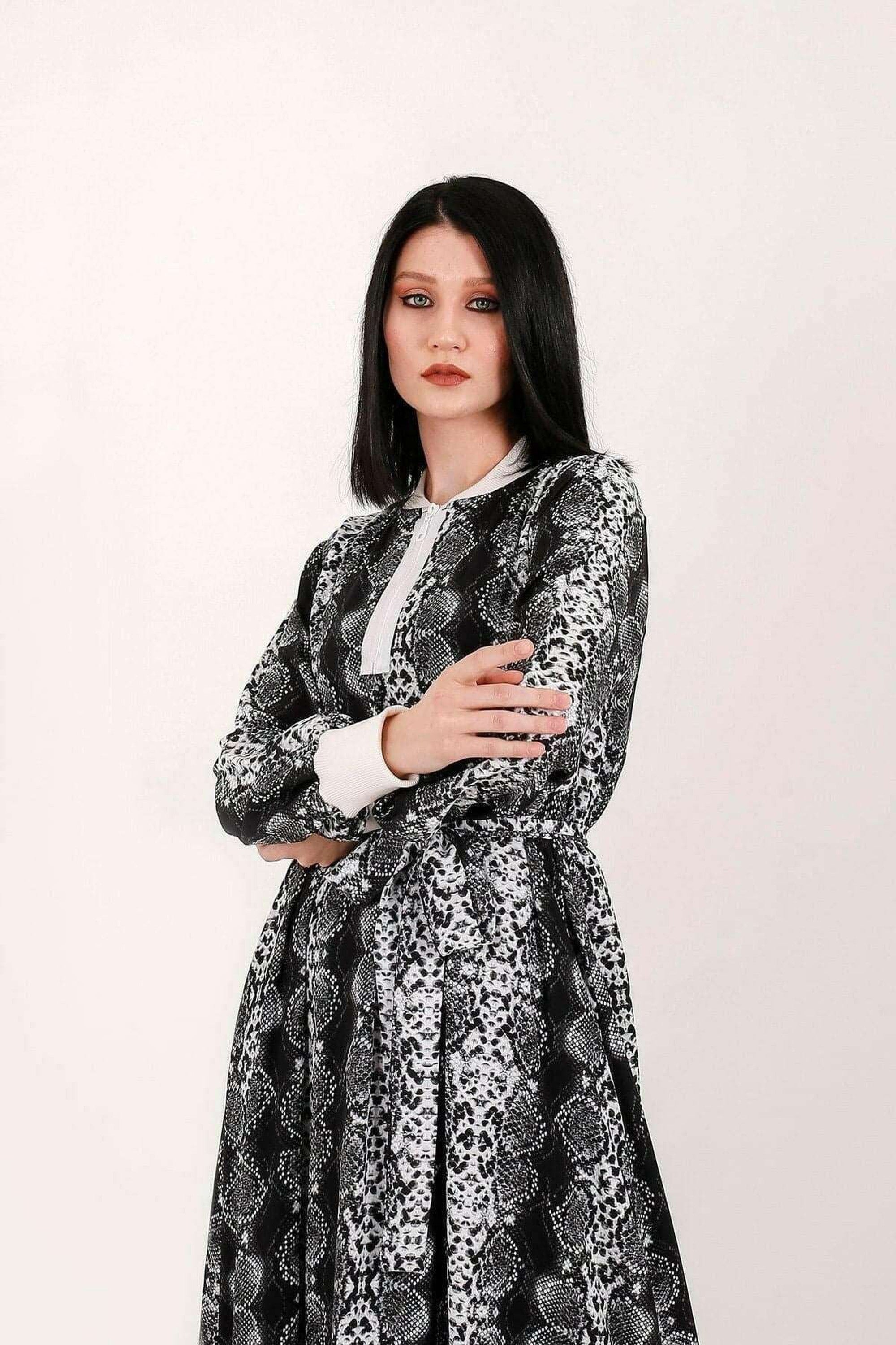 BY Baano Liliana long maxi dress with long sleeves and elastic cuffs, flowing fabric and elegant style.