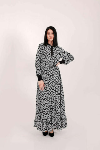 BY Baano Lola long maxi dress with elastic cuffs and neckline, flowing fabric, elegant design, perfect for casual or formal occasions.