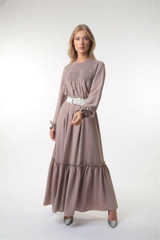 BY Baano Mina tiered long maxi dress with long sleeves, flowing fabric, and elegant design perfect for casual or formal wear.