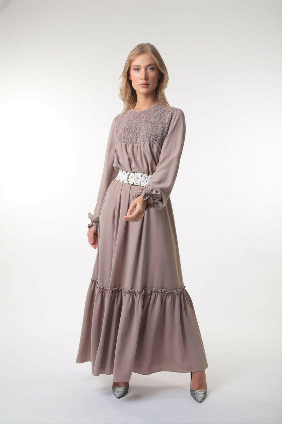 BY Baano Mina tiered long maxi dress with long sleeves, flowing fabric, and elegant design perfect for casual or formal wear.