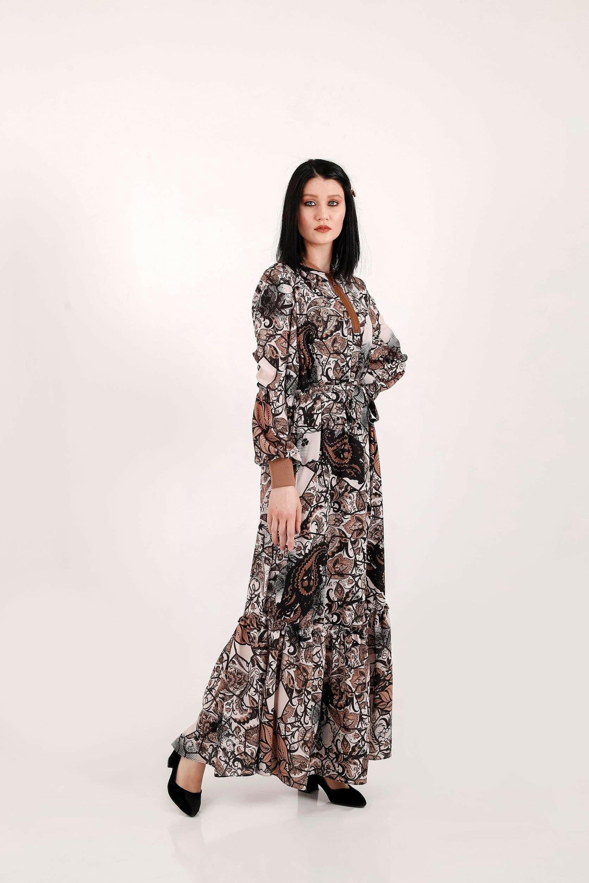 BY Baano paisley maxi dress with long sleeves, flowing fabric, and intricate paisley pattern, perfect for elegant occasions.
