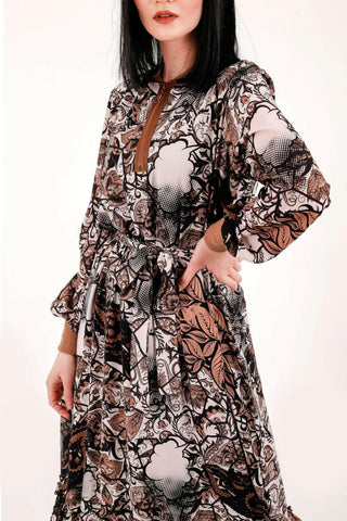 BY Baano paisley maxi dress with long sleeves, flowing fabric, and intricate paisley pattern perfect for elegant summer wear.