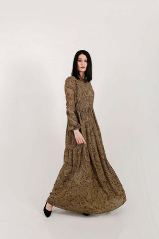 BY Baano Yalda modest maxi dress in olive green with long sleeves, flowing fabric and elegant design for modest style.