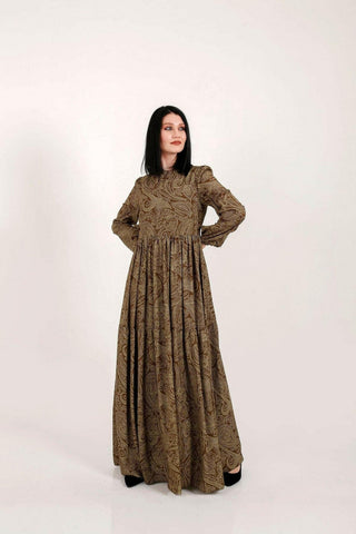 BY Baano Yalda Modest Maxi Dress in olive green with long sleeves, flowing and elegant for a stylish modest look.
